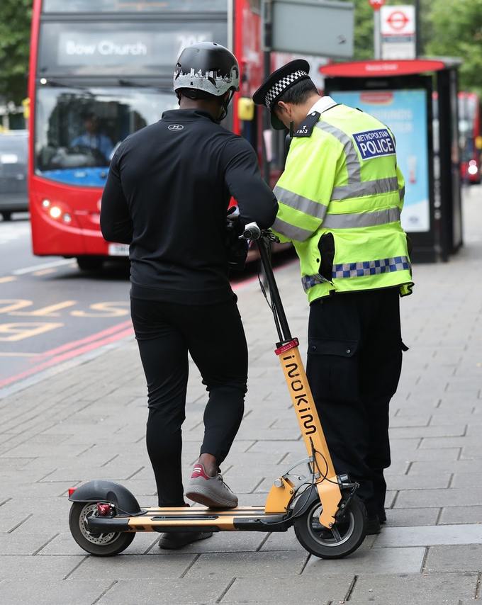 Police Officer in London Stops E-Scooter Rider